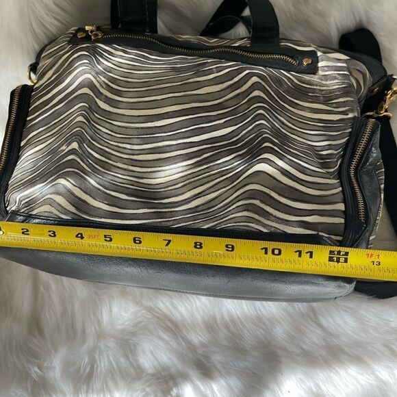 - Tory Burch Nylon Zebra prints & black leather Weekender bag with shoul… - Picture 9 of 15